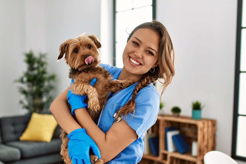 Dr Holding Dog With Tongue Out
