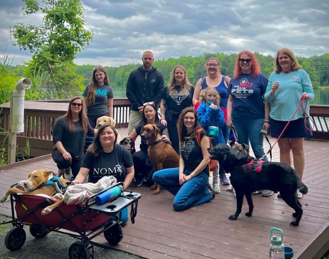 Large Group With Pets On Deck